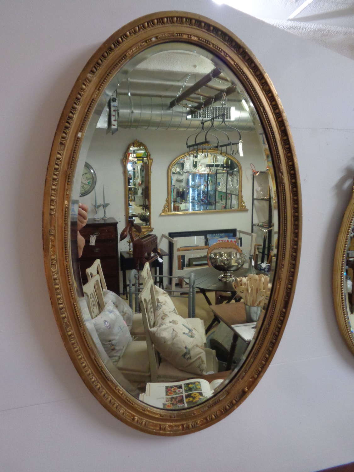Antique Gold Gilt Bevelled Oval Mirror.