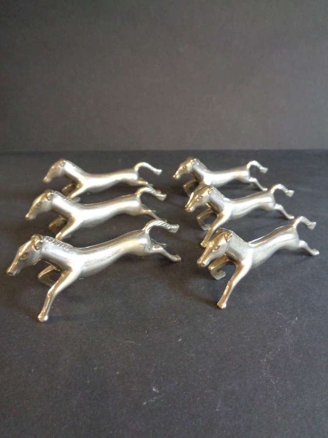 Six Vintage French 'Horse' Knife Rests