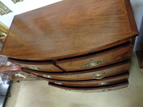 Antique Flame Mahogany Chest of Drawers - Bow Fronted