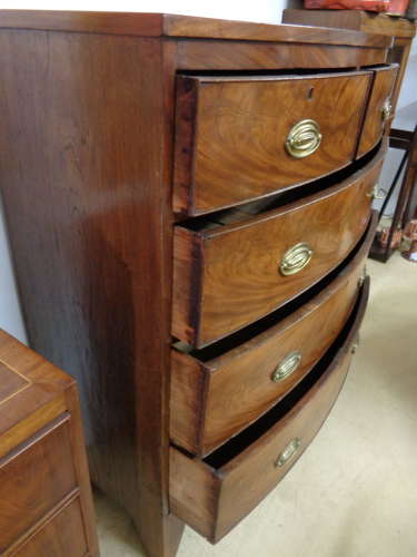 Antique Flame Mahogany Chest of Drawers - Bow Fronted