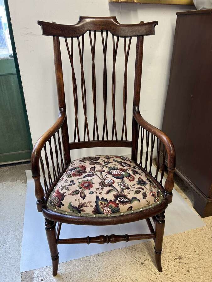 Antique Armchair with twisted cane back & sides, upholstered seat